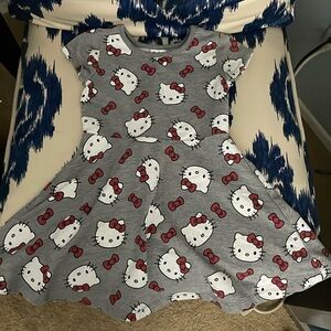 Cute Hello Kitty dress one orange mark as pictured. Runs small